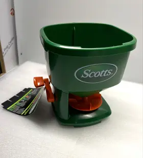 71074 The Scotts Company Hand-powered Spreader For Grass Seed Fertilizer Salt Ice Melt Handheld