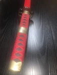 One Piece Roronoa Zoro Katana Sandai Kitetsu Red Wood Handle Carbon Steel Blade. Fixed Price $65.00.