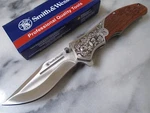 Smith & Wesson Unwavered Assisted Open Pocket Knife Fancy Folder 1193150 Wood. Fixed Price $34.99.