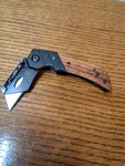 Husky Folding Utility Knife With Pocket Clip Wood Handle , New Blade. Fixed Price $12.50.