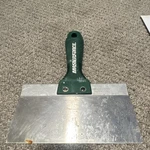 Masterforce Steel Taping Knife Green Handle Wide Blade Single Piece Silver. Fixed Price $15.00.