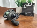 Academy Sports H20 Tac 40 Baitcaster 7.3 + Carbon Fiber Handle 15LB Mono. Fixed Price $79.99.