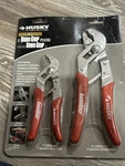 Brand New Set Of 2 - Husky Robogrip Adjustable Pliers 9 & 7". Fixed Price $30.00.