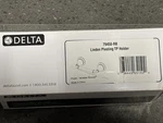 Delta 79450-RB Pivoting Toilet Paper Holder Venetian Bronze. Fixed Price $23.00.
