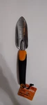Fiskars (#384230-1001) Ergo Tool Garden Transplanter New. Fixed Price $9.50.